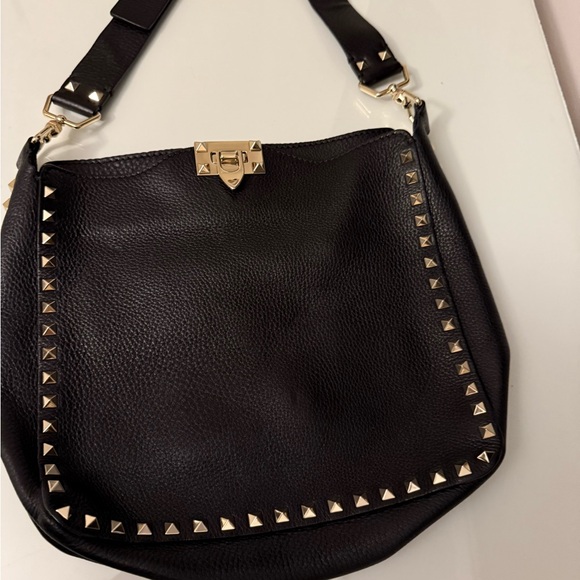 Valentino Garavani Handbags - Valentino Rockstud crossbody bag. Black leather with gold studs. preowned.